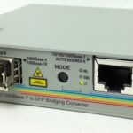 Allied Telesis 10/100/1000Base-T to SFP Bridging Converter AT-GS2002/SP With Avaya AA1419048 Module